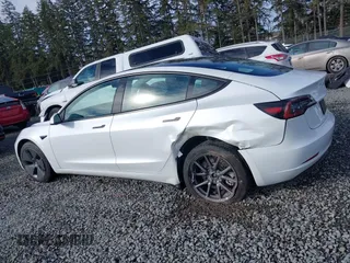 2021 Tesla Model 3 Standard Range Plus z VIN 5YJ3E1EAXMF871730, wystawiony jako IAAI lot #41794274 z przebiegiem 18 791 mil mil oraz . Historia ofert i sprzedaży dostępna na DreamBid. Obrazek 14.