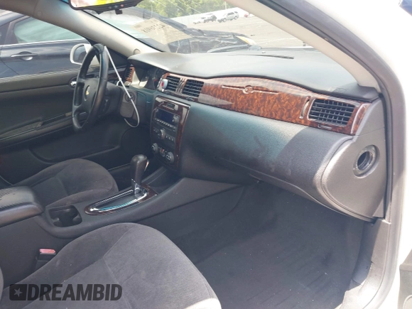 2014 Chevrolet Impala LT with VIN 2G1WB5E34E1101292, listed as a IAAI auction lot 42236918 with 273,654 mi miles and . Bid and sale history available at DreamBid. Image 5.