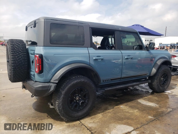 2021 Ford Bronco First Edition with VIN 1FMEE5EP0MLA42596, listed as a Copart auction lot 63210803 with Not Provided miles and . Bid and sale history available at DreamBid. Image 3.