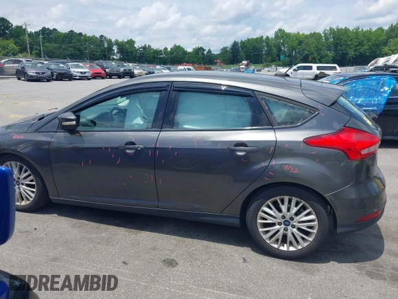 2016 Ford Focus Titanium with VIN 1FADP3N20GL275763, listed as a IAAI auction lot 42511959 with 124,891 mi miles and . Bid and sale history available at DreamBid. Image 14.