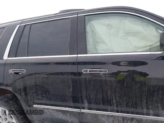 2020 GMC Yukon Denali with VIN 1GKS2CKJ5LR301216, listed as a IAAI auction lot 41439076 with 76,129 mi miles. Bid and sale history available at carsss.com. Image 13.