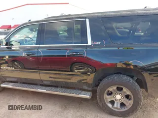 2016 Chevrolet Suburban LT with VIN 1GNSKHKC4GR275389, listed as a IAAI auction lot 41796216 with 144,776 mi miles and . Bid and sale history available at DreamBid. Image 15.