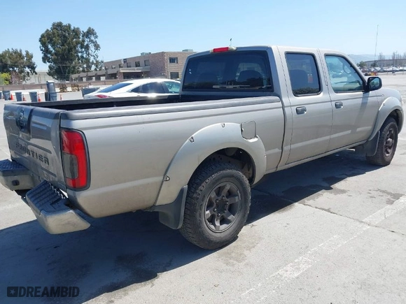 2004 Nissan Frontier 2WD XE with VIN 1N6ED29X84C432617, listed as a IAAI auction lot 42007334 with 289,554 mi miles. Bid and sale history available at carsss.com. Image 4.