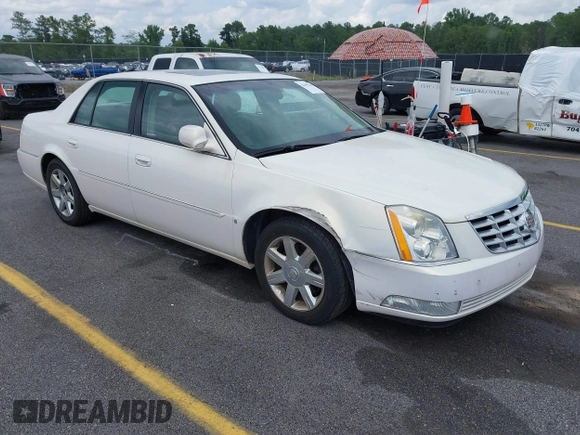 2007 Cadillac DTS Luxury I z VIN 1G6KD57Y67U123765, wystawiony jako IAAI lot #42495242 z przebiegiem 56 193 mil mil oraz . Historia ofert i sprzedaży dostępna na DreamBid. Obrazek 1.