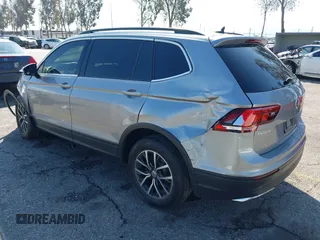 2021 Volkswagen Tiguan S with VIN 3VV1B7AX6MM131036, listed as a IAAI auction lot 41742604 with 55,155 mi miles and . Bid and sale history available at DreamBid. Image 3.
