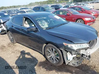 2015 Acura TLX with VIN 19UUB1F31FA023293, listed as a IAAI auction lot 40310652 with 117,350 mi miles. Bid and sale history available at carsss.com. Image 1.