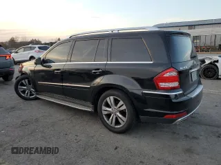 2012 Mercedes-Benz GL-Class GL 450 with VIN 4JGBF7BE6CA780282, listed as a Copart auction lot 79071644 with 156,894 mi miles and Salvage Title. Bid and sale history available at carsss.com. Image 2.