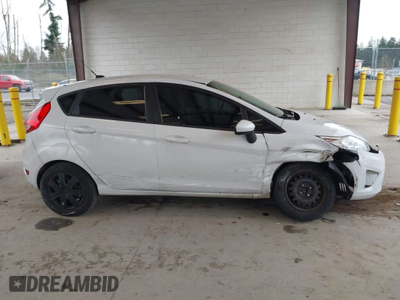 2013 Ford Fiesta S with VIN 3FADP4TJ4DM226897, listed as a IAAI auction lot 41916651 with 56,714 mi miles and . Bid and sale history available at DreamBid. Image 12.