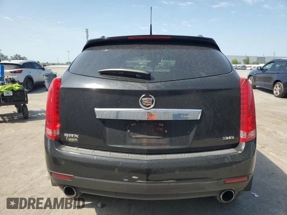 2014 Cadillac SRX Premium Collection with VIN 3GYFNDE35ES591071, listed as a Copart auction lot 57891265 with 134,560 mi miles and Salvage title. Bid and sale history available at DreamBid. Image 6.