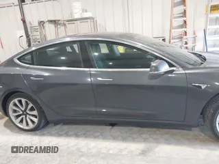 2018 Tesla Model 3 Long Range Battery with VIN 5YJ3E1EB1JF145520, listed as a IAAI auction lot 41360939 with 95,010 mi miles and . Bid and sale history available at DreamBid. Image 13.