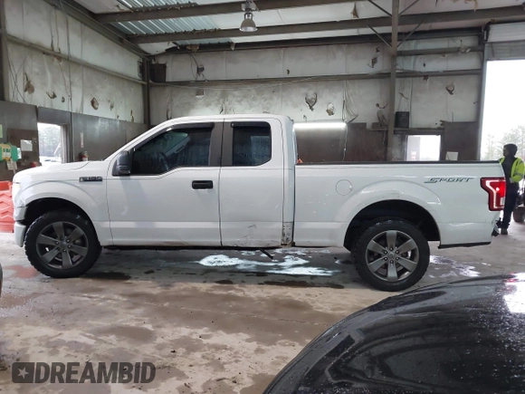 2015 Ford F-150 XL with VIN 1FTEX1C84FKF19753, listed as a IAAI auction lot 41561147 with 170,675 mi miles. Bid and sale history available at carsss.com. Image 14.