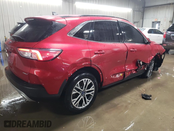 2021 Ford Escape SEL z VIN 1FMCU9H65MUA52054, wystawiony jako Copart lot #42013815 z przebiegiem 59 574 mil mil oraz Szkoda całkowita • Salvage title. Historia ofert i sprzedaży dostępna na DreamBid. Obrazek 3.