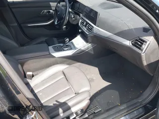 2021 BMW 3 Series 330i with VIN 3MW5R1J09M8B93600, listed as a IAAI auction lot 41735270 with 77,648 mi miles. Bid and sale history available at carsss.com. Image 5.