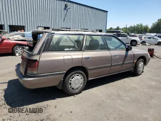 1993 Subaru Legacy L with VIN 4S3BJ6339P6948161, listed as a Copart auction lot 63123584 with 329,619 mi miles and Salvage Title. Bid and sale history available at DreamBid. Image 3.
