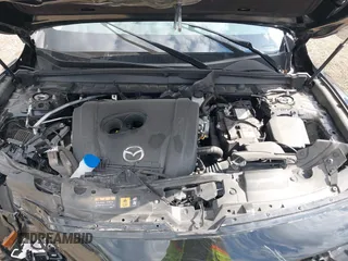 2024 Mazda CX-50 S Premium with VIN 7MMVABDM0RN185128, listed as a IAAI auction lot 42383177 with 21,267 mi miles and . Bid and sale history available at DreamBid. Image 10.
