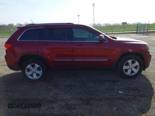 2013 Jeep Grand Cherokee Laredo with VIN 1C4RJEAG9DC538259, listed as a IAAI auction lot 41832676 with 143,000 mi miles. Bid and sale history available at carsss.com. Image 13.