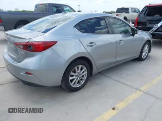2015 Mazda 3 i Touring z VIN 3MZBM1V73FM144587, wystawiony jako IAAI lot #42422701 z przebiegiem 130 483 mil mil oraz . Historia ofert i sprzedaży dostępna na DreamBid. Obrazek 4.