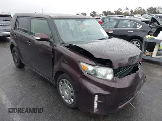 2015 Scion xB with VIN JTLZE4FE7FJ068936, listed as a IAAI auction lot 41565886 with 94,671 mi miles. Bid and sale history available at carsss.com. Image 1.