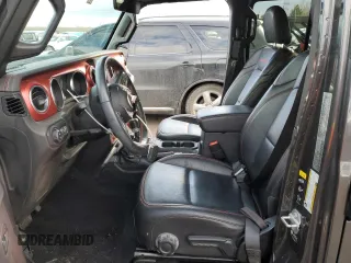 2021 Jeep Gladiator Rubicon with VIN 1C6JJTBG4ML504141, listed as a Copart auction lot 43367565 with 56,879 mi miles and Salvage title. Bid and sale history available at DreamBid. Image 7.