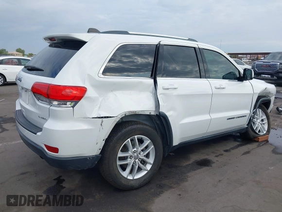 2017 Jeep Grand Cherokee Altitude with VIN 1C4RJEAG3HC605914, listed as a IAAI auction lot 42766426 with 84,706 mi miles and . Bid and sale history available at DreamBid. Image 4.