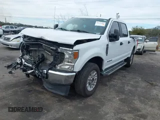 2022 Ford F-250 XL z VIN 1FT7W2BTXNEF76074, wystawiony jako IAAI lot #41339363 z przebiegiem 70 594 mil mil oraz . Historia ofert i sprzedaży dostępna na DreamBid. Obrazek 2.