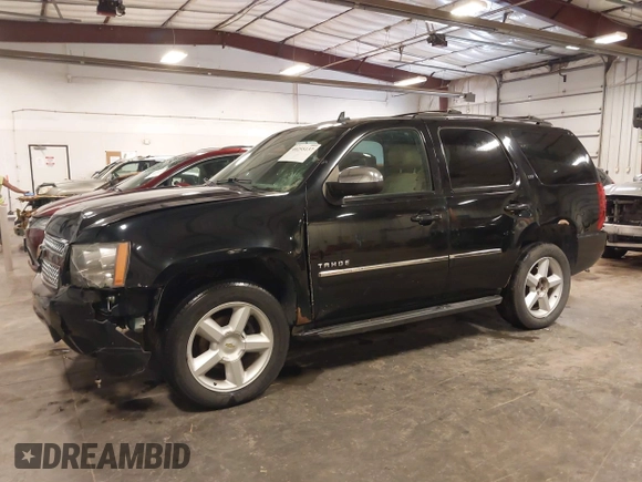 2012 Chevrolet Tahoe LTZ with VIN 1GNSKCE02CR297261, listed as a IAAI auction lot 40255137 with 283,110 mi miles and . Bid and sale history available at DreamBid. Image 15.