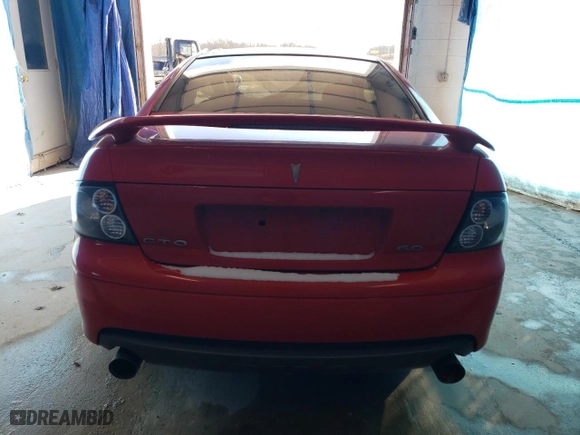2005 Pontiac GTO with VIN 6G2VX12U95L425995, listed as a Copart auction lot 84426864 with 81,840 mi miles and Salvage Title. Bid and sale history available at carsss.com. Image 6.