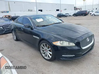 2014 Jaguar XJ z VIN SAJWA1CZ9E8V60522, wystawiony jako IAAI lot #41919728 z przebiegiem 122 184 mil mil oraz . Historia ofert i sprzedaży dostępna na DreamBid. Obrazek 1.