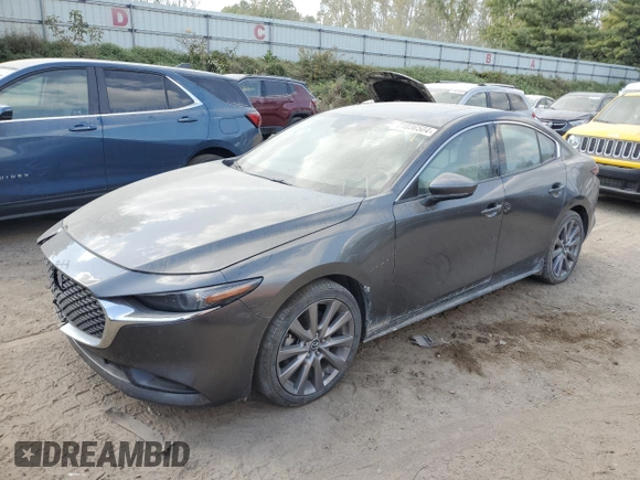 2019 Mazda 3 Premium with VIN JM1BPBEMXK1119599, listed as a Copart auction lot 71036504 with 61,371 mi miles and Salvage Title. Bid and sale history available at DreamBid. Image 1.