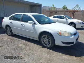 2013 Chevrolet Impala LTZ with VIN 2G1WC5E39D1218264, listed as a IAAI auction lot 41982234 with 192,884 mi miles and . Bid and sale history available at DreamBid. Image 1.