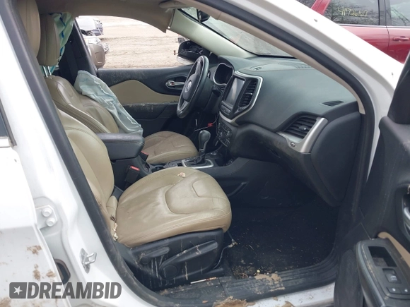 2015 Jeep Cherokee Limited with VIN 1C4PJMDB7FW584076, listed as a IAAI auction lot 41712661 with 183,000 mi miles and . Bid and sale history available at DreamBid. Image 5.
