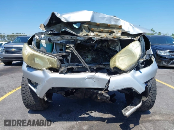 2013 Toyota Tacoma PreRunner z VIN 5TFJU4GN6DX032952, wystawiony jako IAAI lot #42001014 z przebiegiem 152 755 mil mil oraz . Historia ofert i sprzedaży dostępna na DreamBid. Obrazek 6.