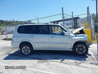 2006 Suzuki XL7 z VIN JS3TX92V664105084, wystawiony jako IAAI lot #42191244 z przebiegiem Nie podano mil oraz . Historia ofert i sprzedaży dostępna na DreamBid. Obrazek 13.