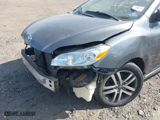 2009 Toyota Matrix S with VIN 2T1LE40E39C001020, listed as a IAAI auction lot 41801991 with 999,999 mi miles. Bid and sale history available at carsss.com. Image 6.
