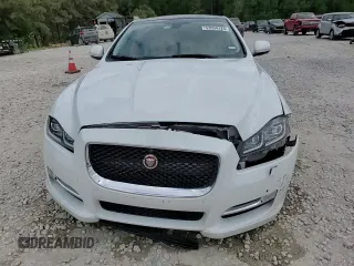 2016 Jaguar XJ R-Sport z VIN SAJWA1C71G8V92642, wystawiony jako Copart lot #53094125 z przebiegiem 98 548 mil mil oraz Szkoda całkowita • Salvage title. Historia ofert i sprzedaży dostępna na DreamBid. Obrazek 13.