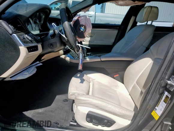 2015 BMW 5 Series 550i with VIN WBAKN9C59FD961491, listed as a Copart auction lot 60208745 with 70,241 mi miles and Salvage title. Bid and sale history available at DreamBid. Image 7.
