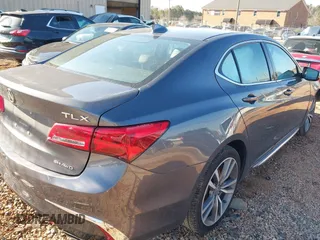 2020 Acura TLX w/Technology Pkg with VIN 19UUB3F49LA003406, listed as a IAAI auction lot 41352592 with 73,125 mi miles. Bid and sale history available at carsss.com. Image 4.