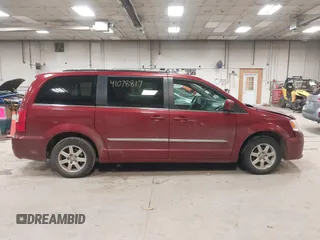 2012 Chrysler Town & Country Touring with VIN 2C4RC1BG1CR314023, listed as a IAAI auction lot 41078817 with Not Provided miles and . Bid and sale history available at DreamBid. Image 13.