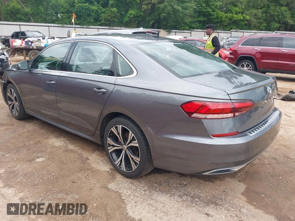 2021 Volkswagen Passat SE with VIN 1VWSA7A34MC019045, listed as a IAAI auction lot 42164157 with 78,436 mi miles and . Bid and sale history available at DreamBid. Image 3.