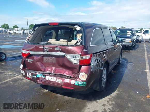 2013 Honda Odyssey LX z VIN 5FNRL5H25DB058422, wystawiony jako IAAI lot #42247200 z przebiegiem 137 053 mil mil oraz . Historia ofert i sprzedaży dostępna na DreamBid. Obrazek 6.