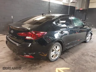 2019 Hyundai Elantra SEL with VIN 5NPD84LF1KH467449, listed as a IAAI auction lot 41693597 with 76,959 mi miles. Bid and sale history available at carsss.com. Image 4.