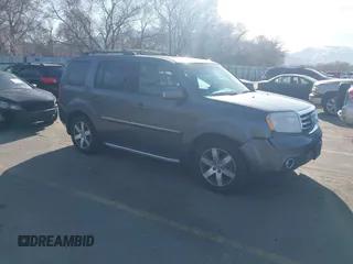 2013 Honda Pilot Touring with VIN 5FNYF4H94DB035692, listed as a IAAI auction lot 41771116 with 137,464 mi miles. Bid and sale history available at carsss.com. Image 1.