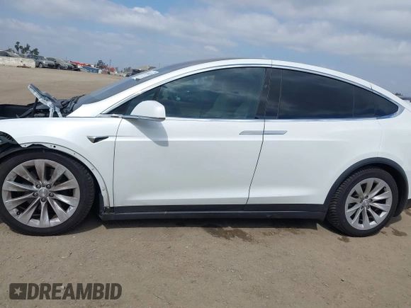 2020 Tesla Model X Long Range with VIN 5YJXCDE26LF238982, listed as a IAAI auction lot 42100220 with 44,804 mi miles. Bid and sale history available at carsss.com. Image 15.