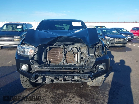 2021 Toyota Tacoma 4WD SR5 with VIN 3TMDZ5BN6MM111605, listed as a IAAI auction lot 41265774 with 68,043 mi miles. Bid and sale history available at carsss.com. Image 13.