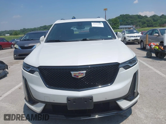 2021 Cadillac XT6 Sport with VIN 1GYKPGRS4MZ222263, listed as a IAAI auction lot 42443907 with 18,353 mi miles and . Bid and sale history available at DreamBid. Image 12.