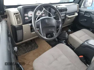 2003 Jeep Wrangler Sport with VIN 1J4FA49S33P345306, listed as a Copart auction lot 46899265 with 143,858 mi miles and Clean Title. Bid and sale history available at carsss.com. Image 8.