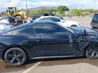 2021 Ford Mustang GT z VIN 1FA6P8CF1M5147740, wystawiony jako IAAI lot #38920487 z przebiegiem 15 299 mil mil oraz . Historia ofert i sprzedaży dostępna na DreamBid. Obrazek 13.
