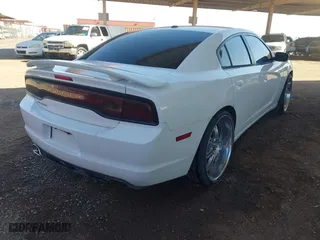 2012 Dodge Charger SE with VIN 2C3CDXBG1CH258360, listed as a IAAI auction lot 41937619 with 127,167 mi miles. Bid and sale history available at carsss.com. Image 4.