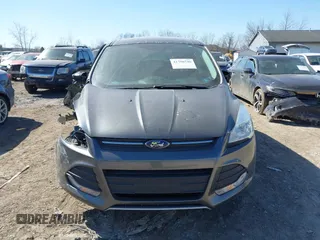 2016 Ford Escape SE with VIN 1FMCU0G73GUC76322, listed as a IAAI auction lot 41796746 with 61,821 mi miles. Bid and sale history available at carsss.com. Image 13.