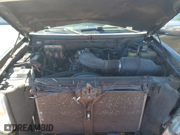 2005 Ford F-150 XLT with VIN 1FTRW12WX5KD67643, listed as a Copart auction lot 48332695 with 254,546 mi miles and Salvage Title. Bid and sale history available at carsss.com. Image 12.